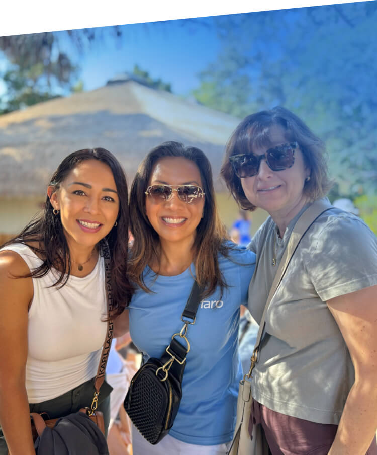 A group portrait of three teammates from Faro Health, a provider of AI-powered protocol design solutions